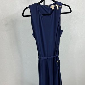Michael Kors navy romper in size L with a gold zipper and belt